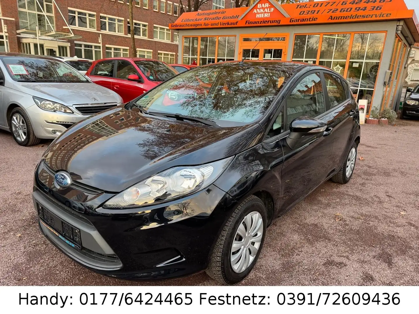 Ford Fiesta 1,25 KLIMA/el.FH/ZV mit FB/8xBEREIFT Schwarz - 1