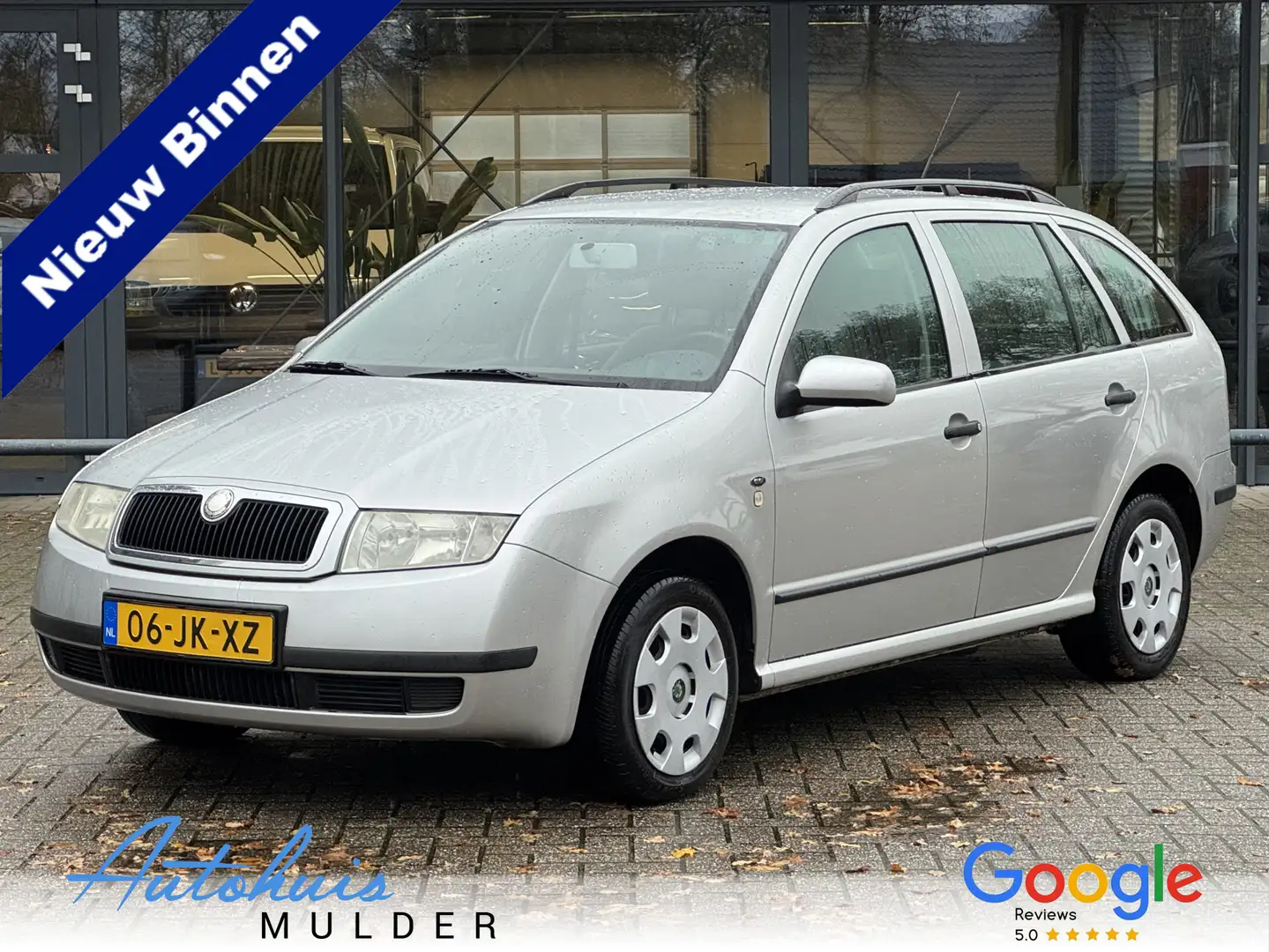 Skoda Fabia Combi 1.4 Comfort Airco/Cruise/Trekhaak Nieuwe APK Grau - 1