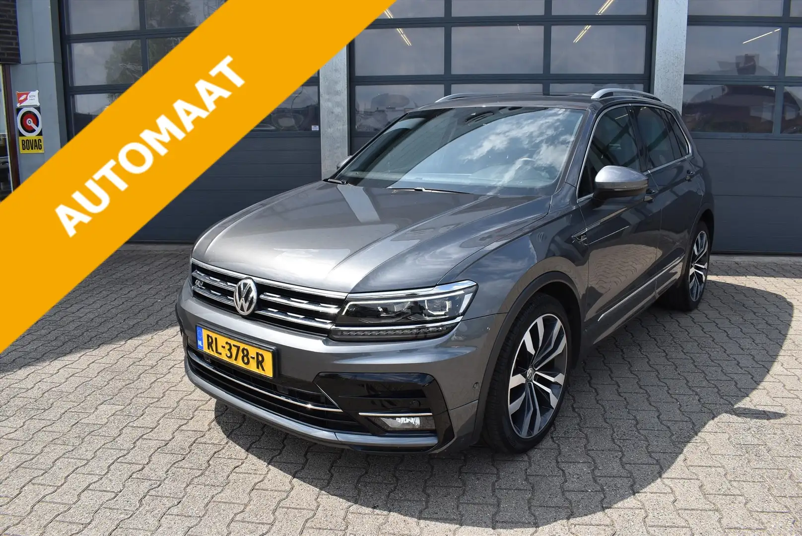 Volkswagen Tiguan 2.0 TSI 180pk 4Motion DSG Highline Business R Grau - 1