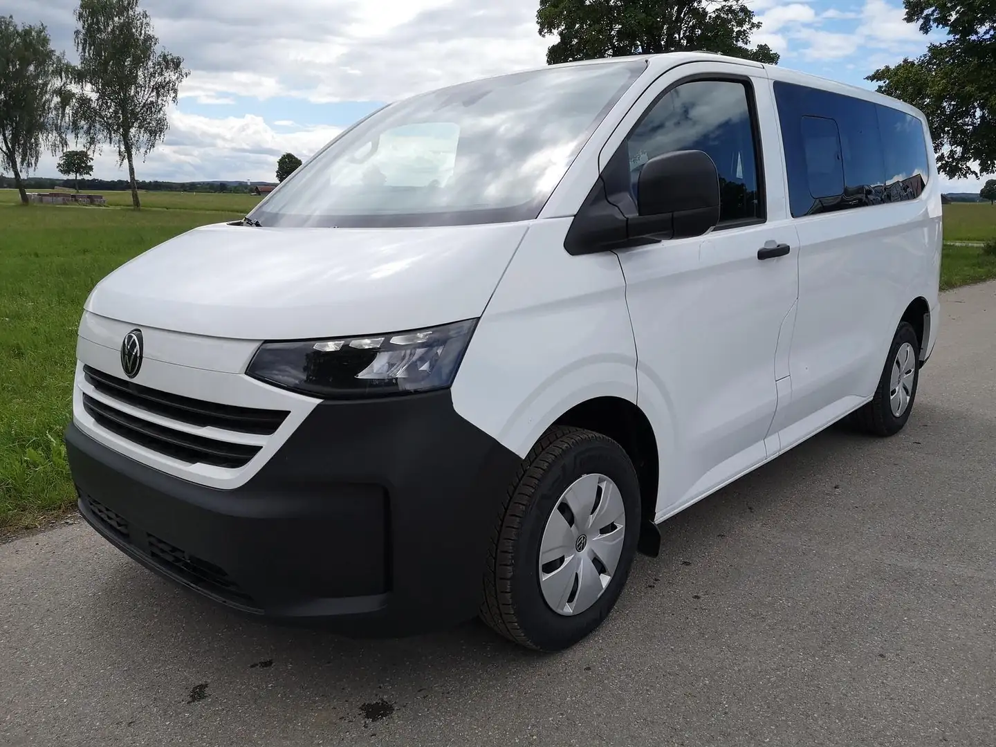 Volkswagen T7 Transporter BEV 100 kW RWD KR e- Kombi 9 Sitze 100 kW (136 ... Weiß - 1