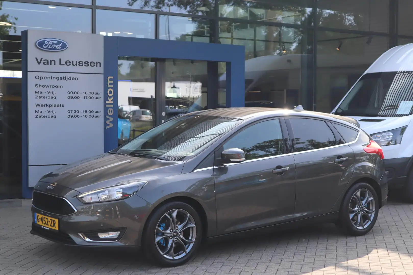 Ford Focus 125PK TITANIUM 5-DEURS NAVI CLIMA STOEL+STUURVERW. Grigio - 1