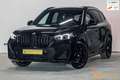 BMW X1 SDrive20i|M-sport|Pano|E-Trekhaak|HUD|H&K|E-stoel| Zwart - thumbnail 1