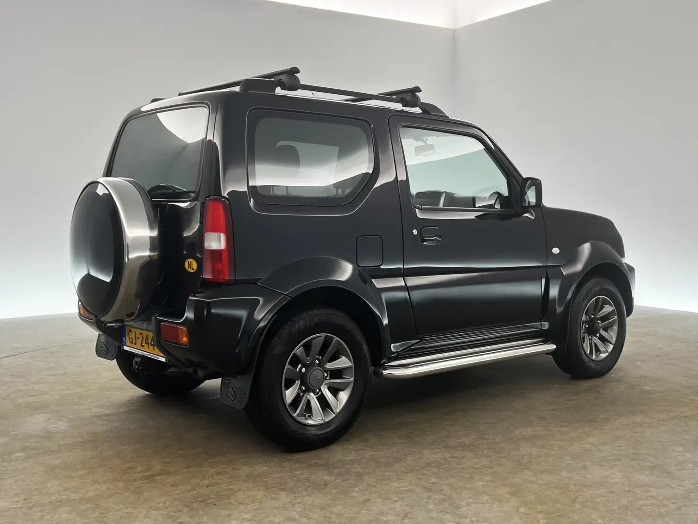 Suzuki Jimny 1.3 Exclusive 4x4 AWD Airco Trekhaak 15"LMV Stoelv Zwart - 2