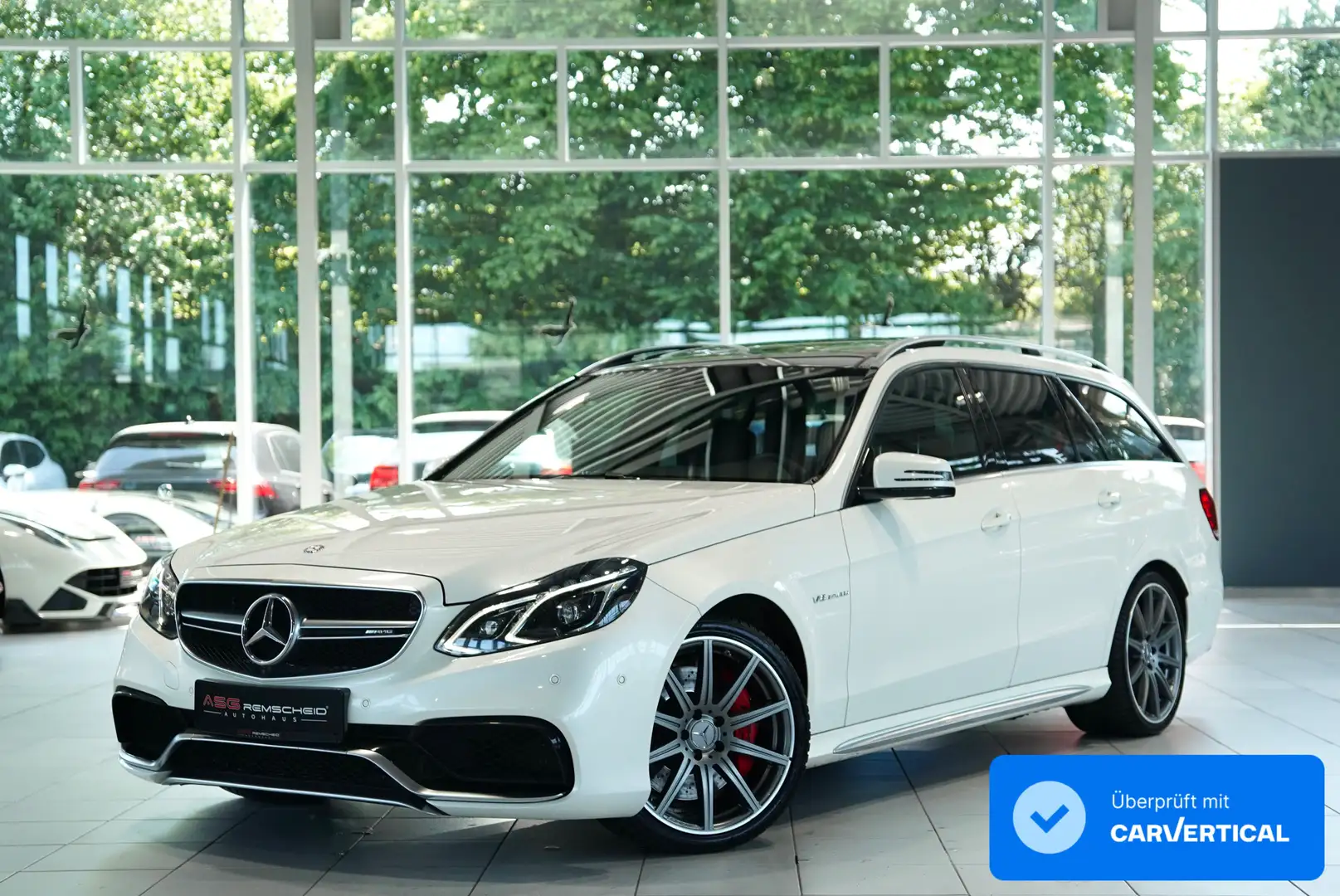 Mercedes-Benz E 63 AMG T 4M *Pano*Driver?sPackage*H&K*Designo Weiß - 1