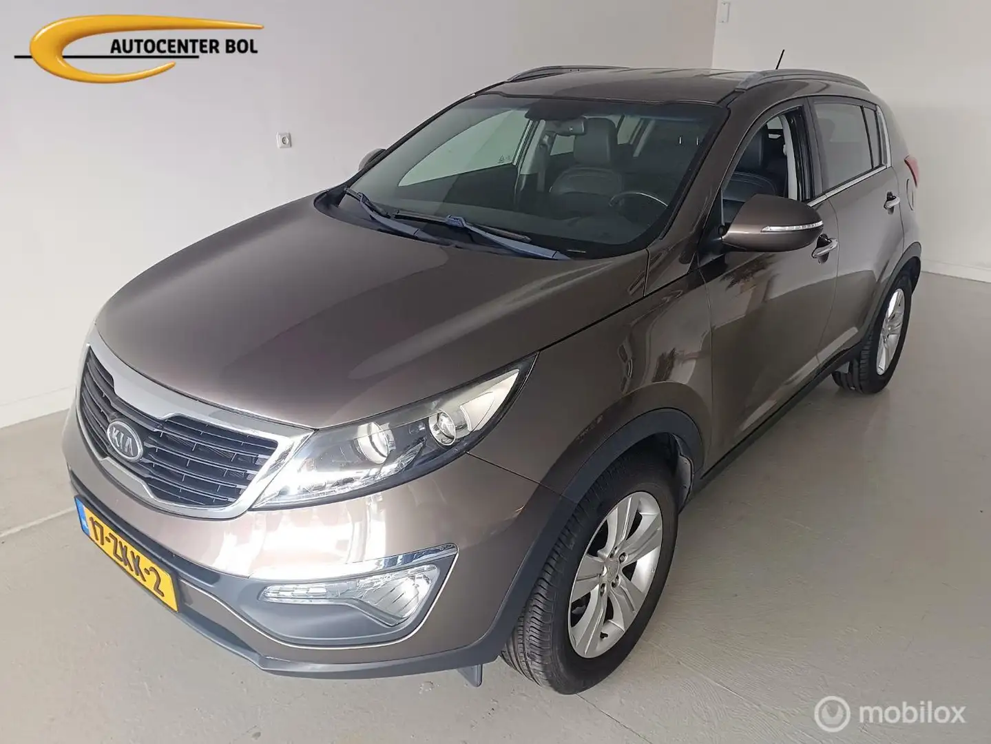 Kia Sportage 2.0 Automaat Plus Pack Bruin - 1