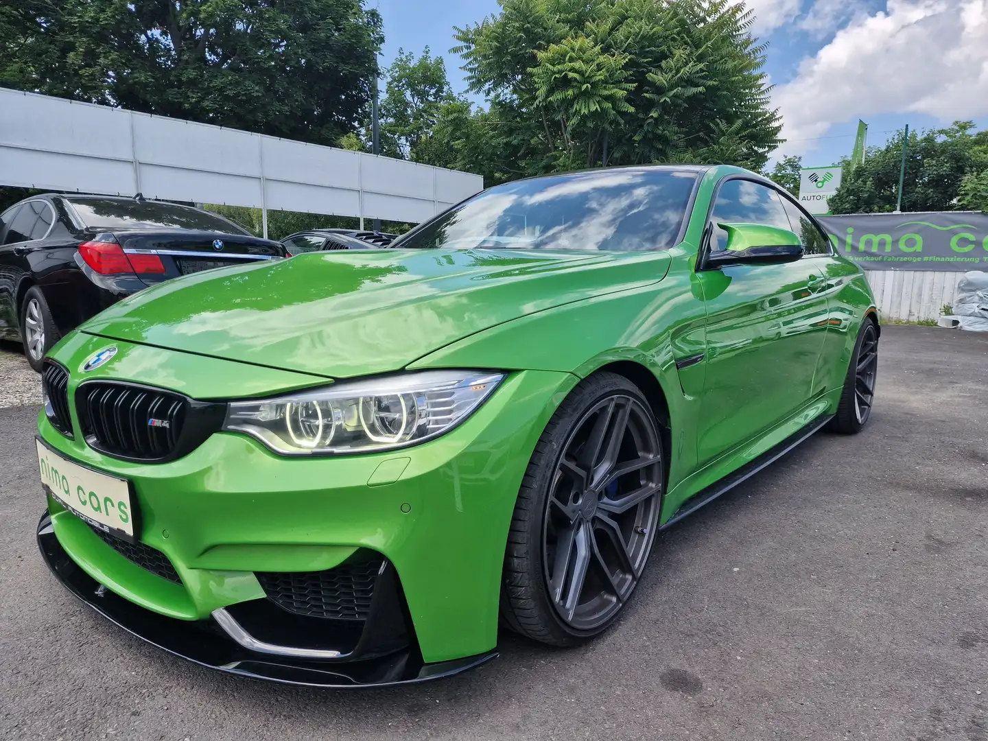 BMW M4 M-DKG Coupe Aut. Grün - 1