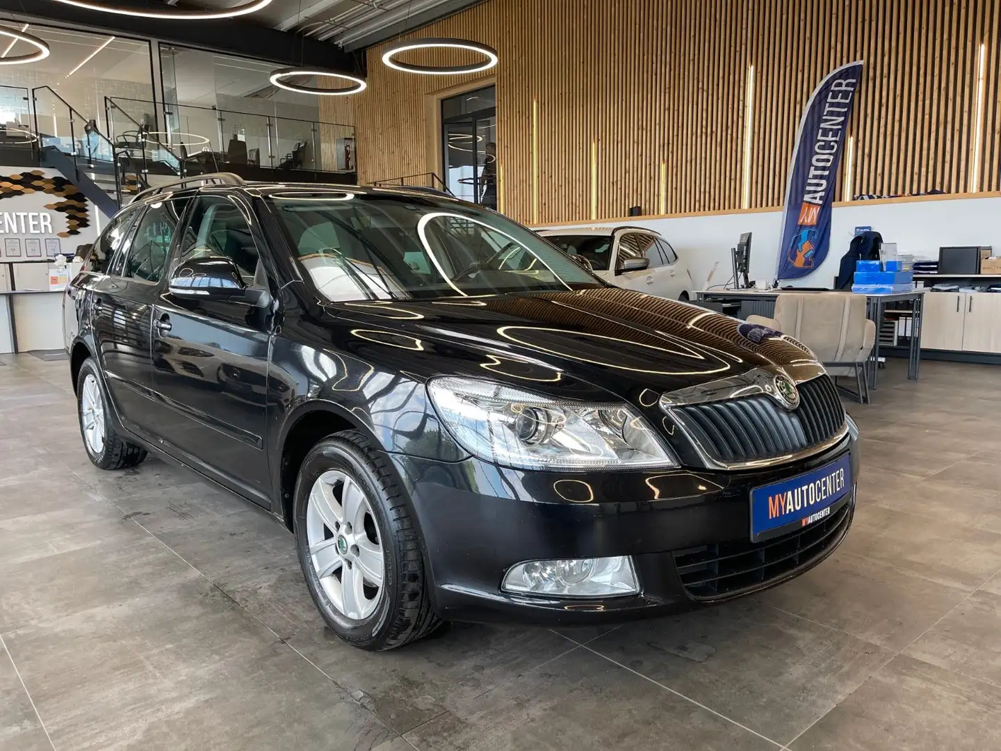 Skoda Octavia Combi Impuls Edition 1.4*SHZ*PDC*2.HAND* Schwarz - 2