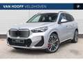 BMW iX1 eDrive20 High Executive M Sport / Panoramadak / Sp Zilver - thumbnail 1