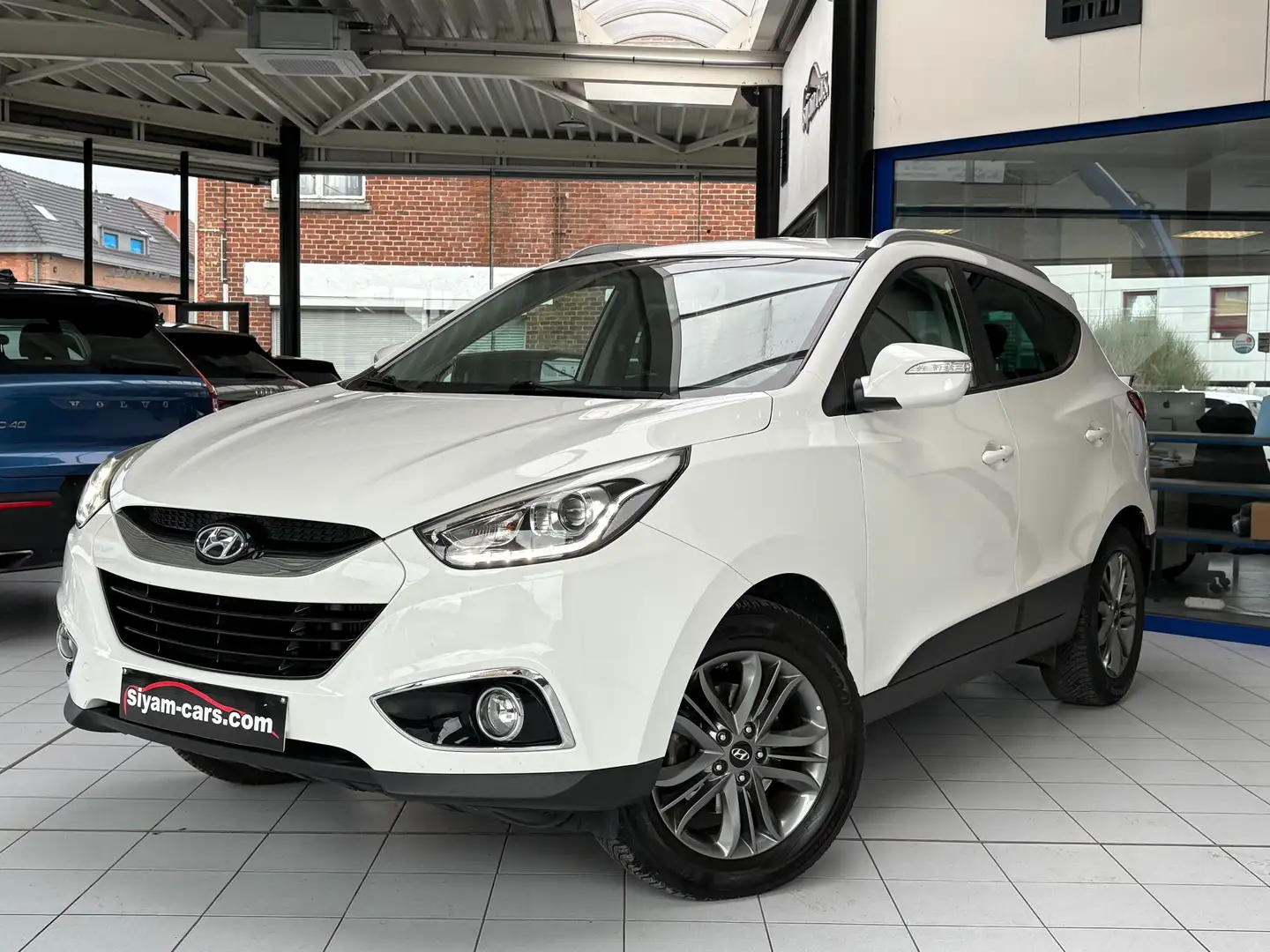 Hyundai iX35 1.7 CRDi *GPS * CUIR * CAMERA * JANTES * CARNET * Blanc - 1