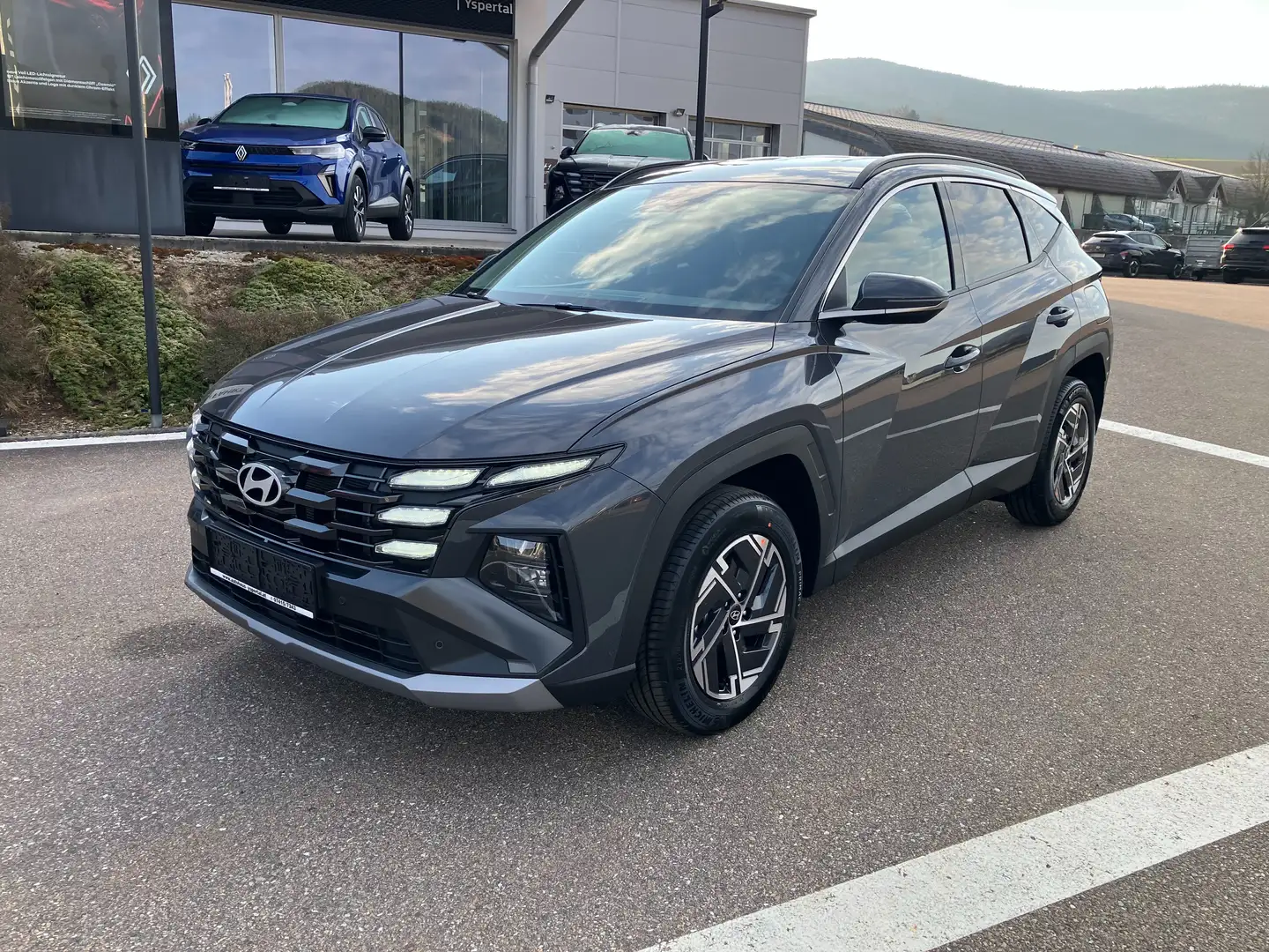 Hyundai TUCSON NX4 Jubile 1,6 T-GDi HEV 4WD Grau - 1