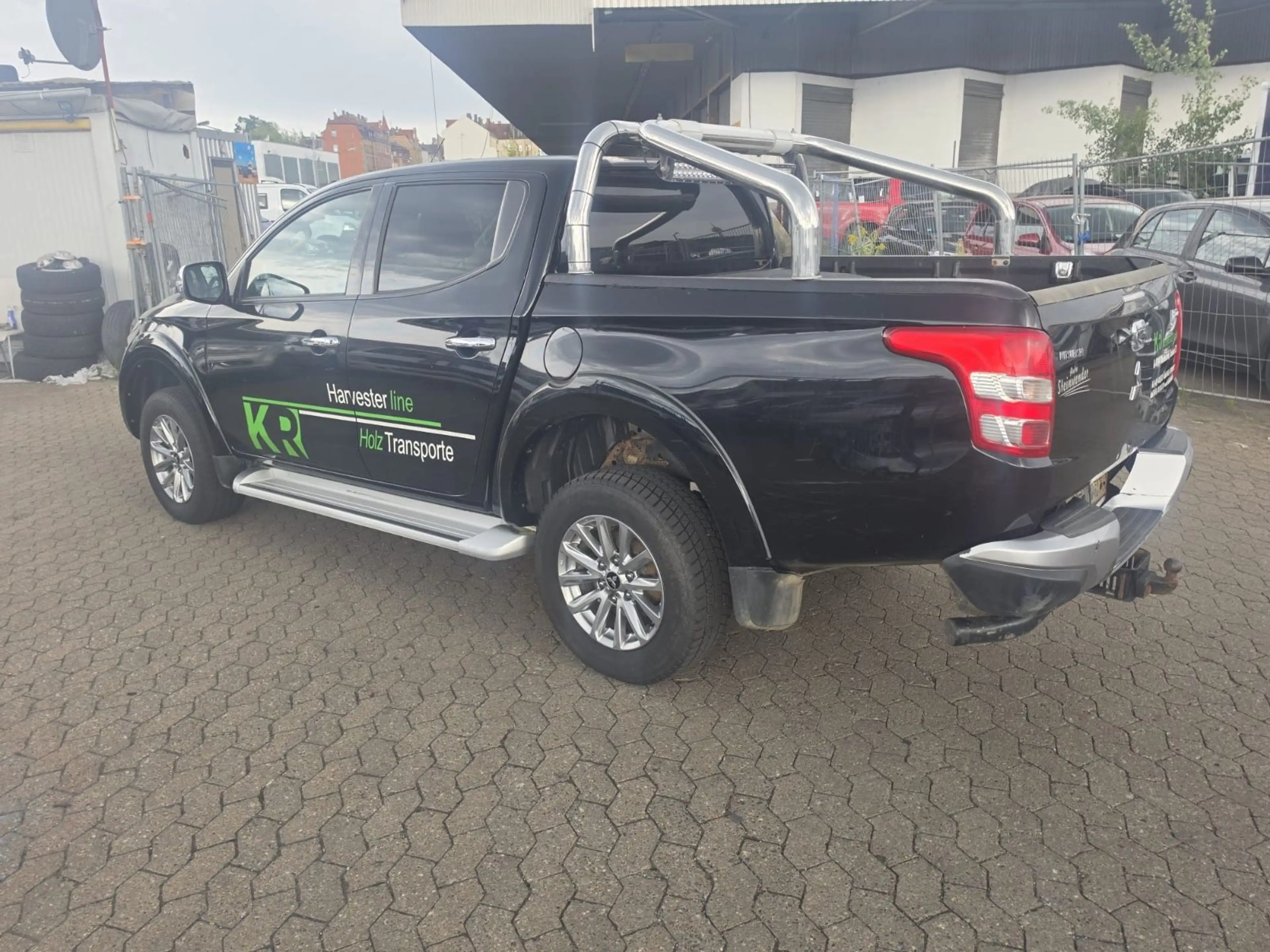 Mitsubishi L200 — photo 11