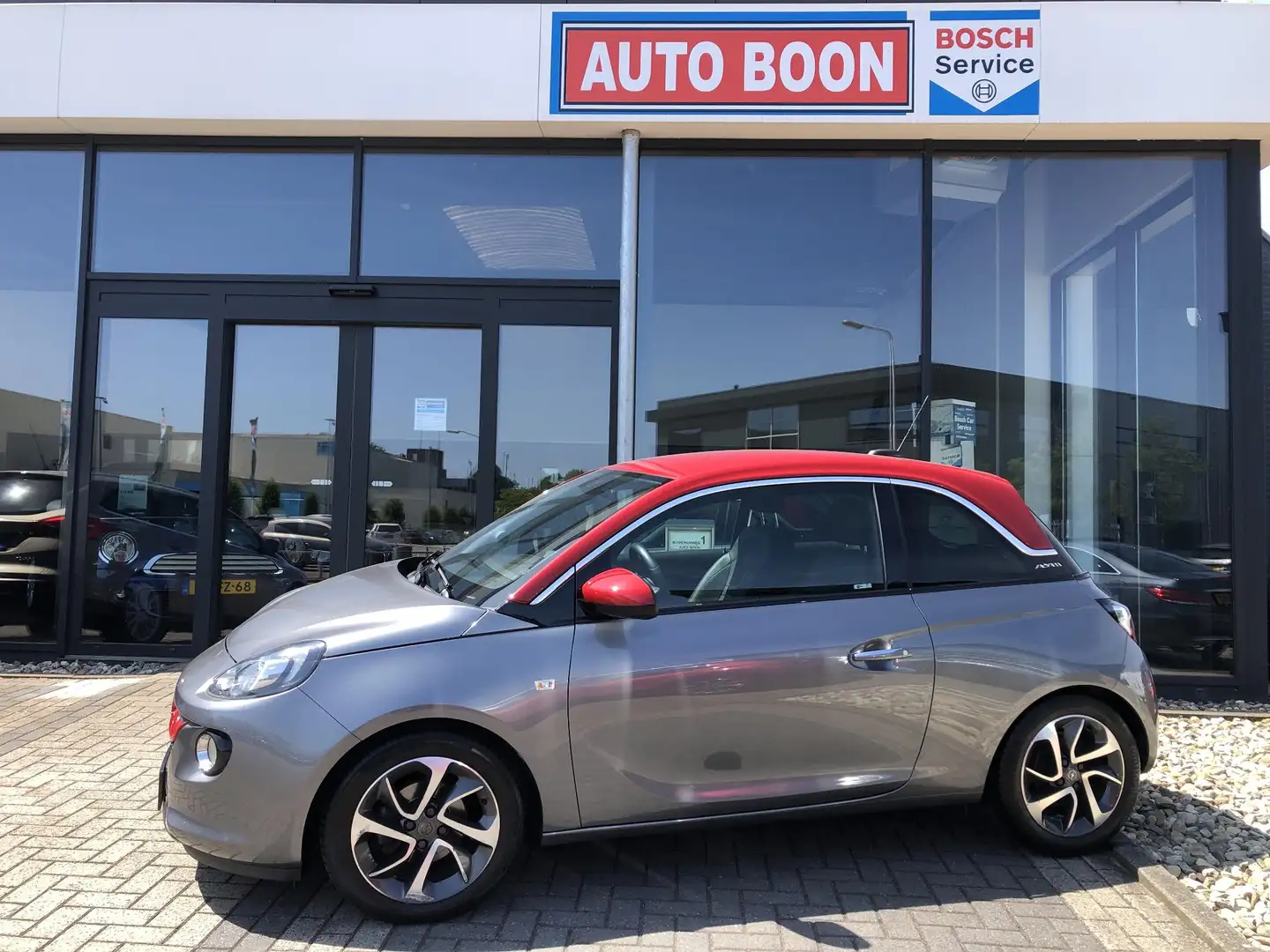 Opel Adam 1.0T 90PK UNLIMITED : LEER-STOF/APPCARPL./PDC/NAVI Grijs - 1