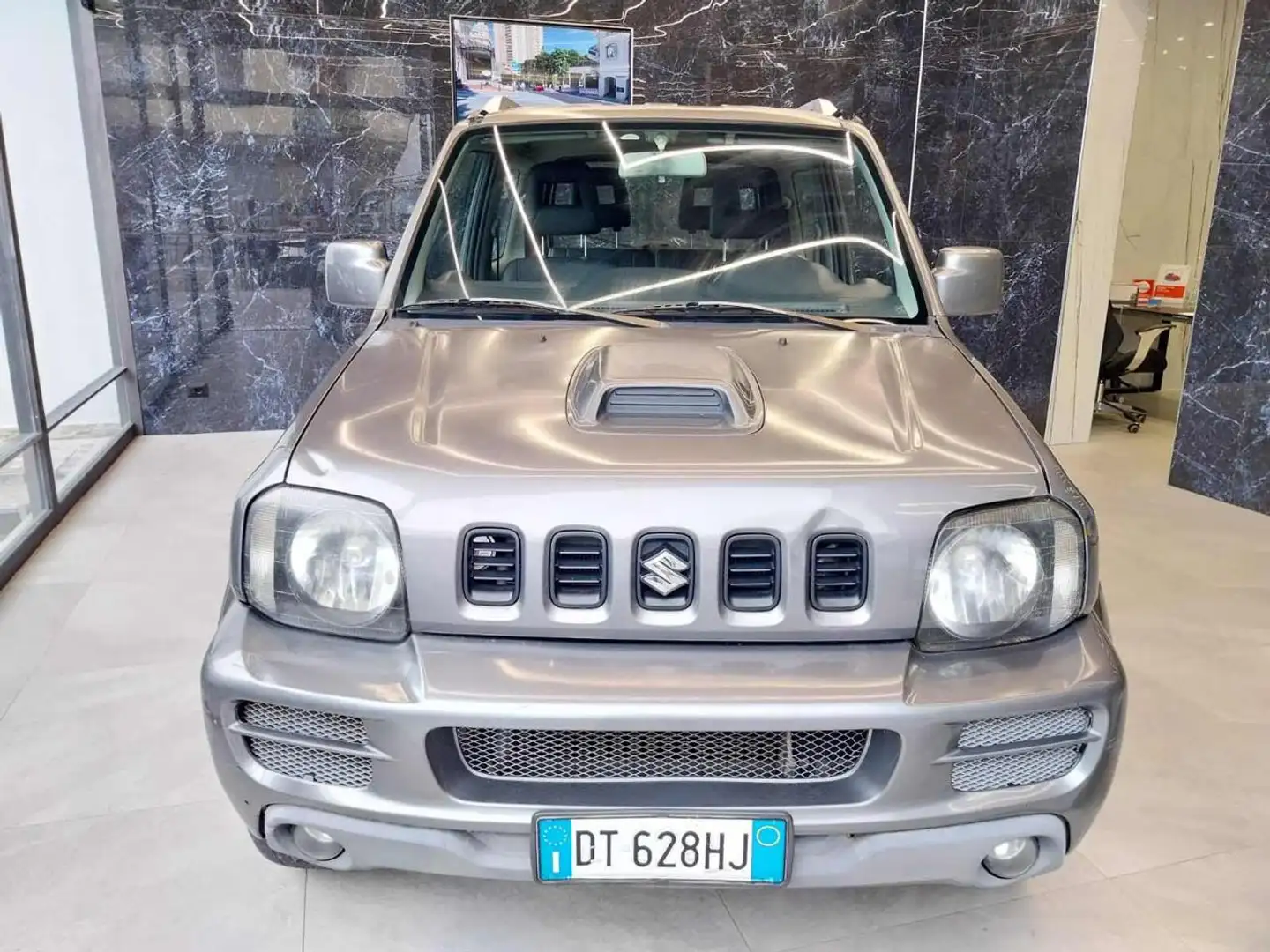 Suzuki Jimny 1.5 DDiS cat 4WD (Garanzia 12 Mesi) Grigio - 1