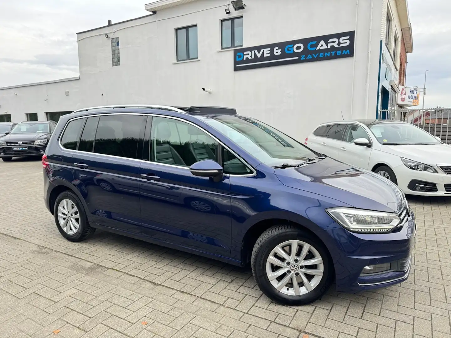 Volkswagen Touran 1.6 TDI - 7PL - FULL OPTION ** 1 JAAR GARANTIE ** Bleu - 1