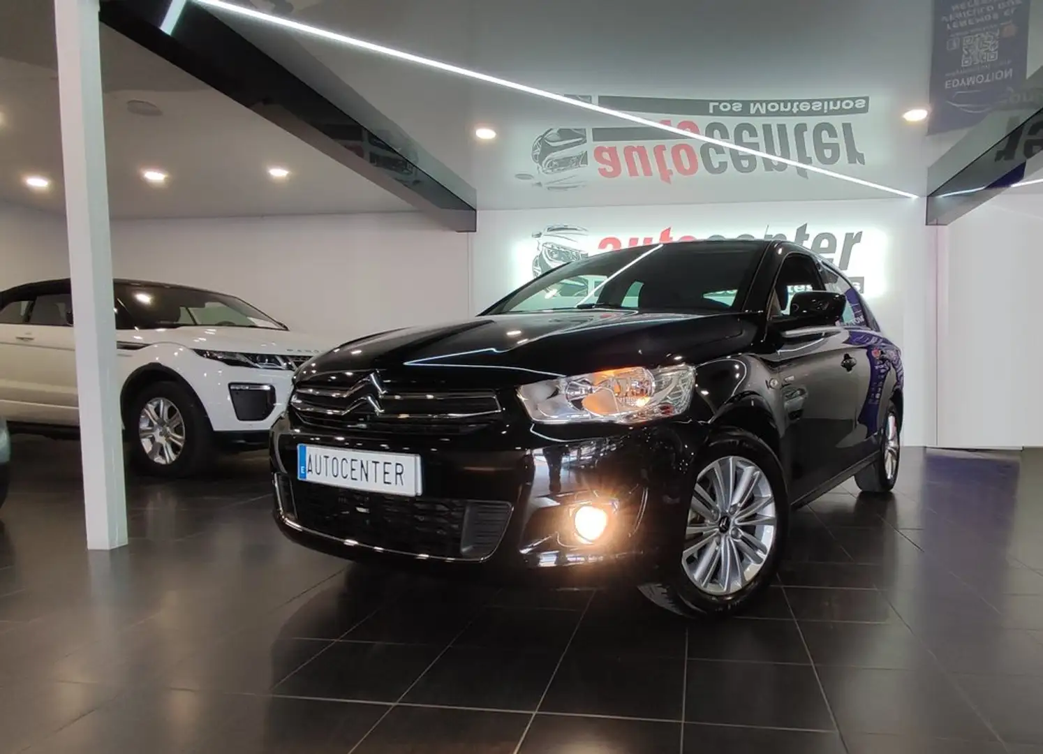 Citroen C-Elysée 1.6BlueHDi Exclusive 100 Noir - 1