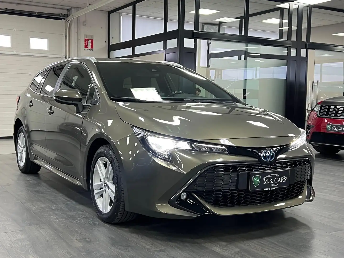 Toyota Corolla Touring Sports 1.8h cvt Bronzo - 1