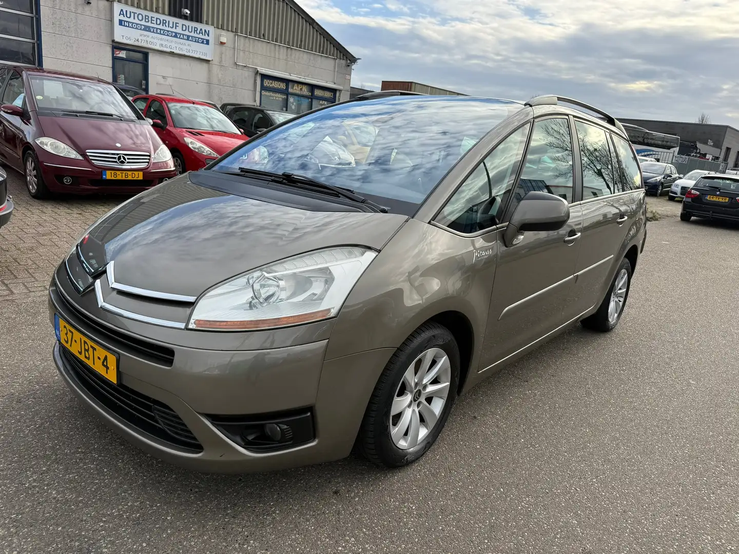 Citroen Grand C4 Picasso 1.6 THP Ambiance EB6V 7p. Automaat NAV.+ Clima Bj: Bruin - 1