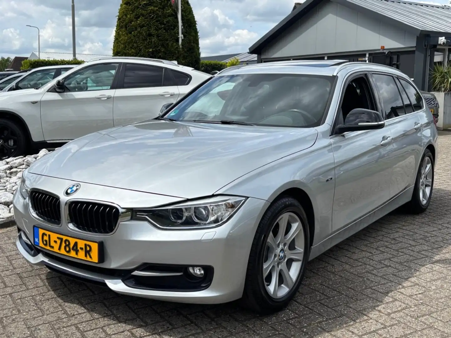 BMW 318 3-serie Touring 318D Aut Sportline 2015 Panodak Tr Grijs - 1