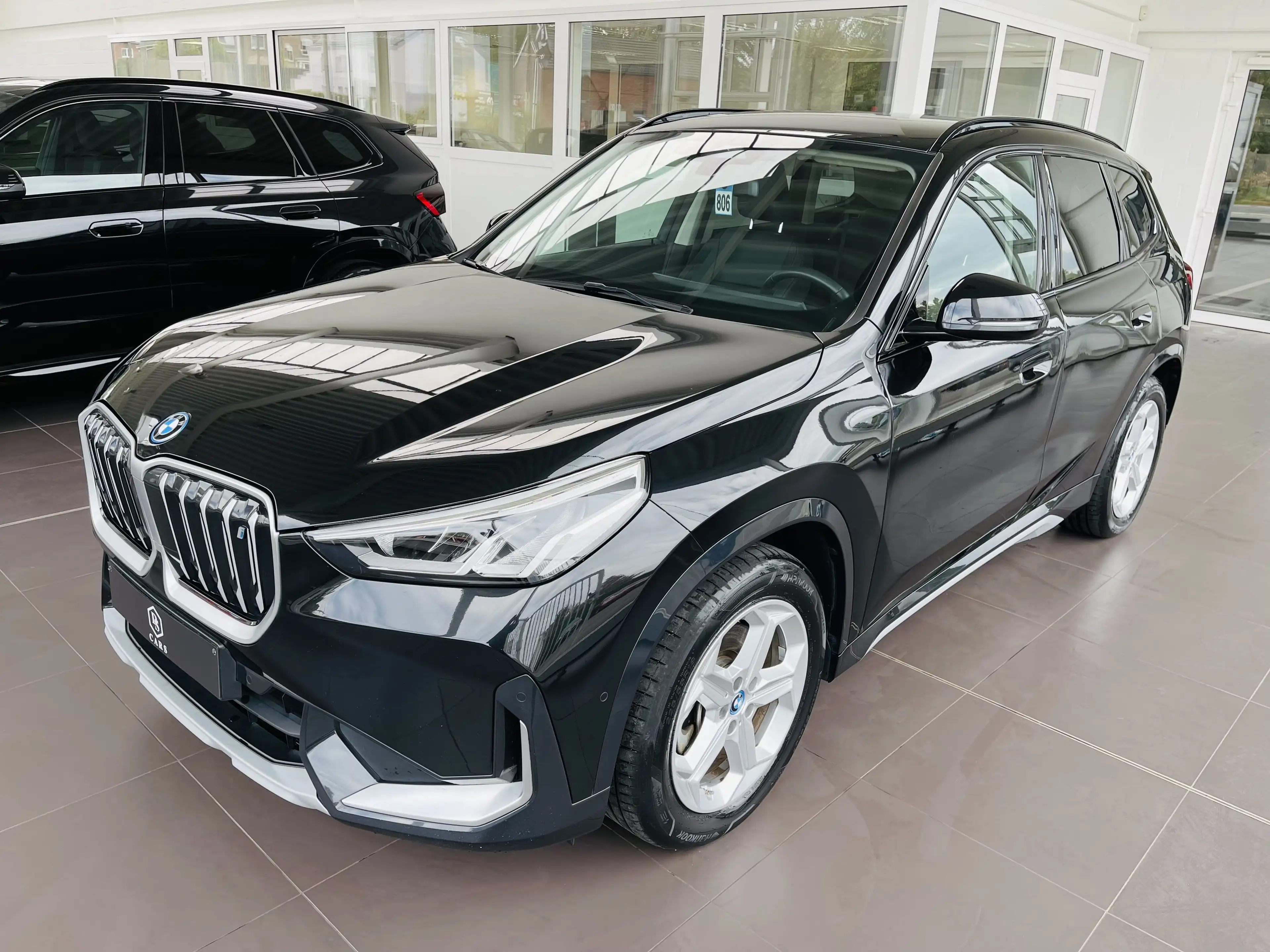 BMW iX1 66.5 kWh xDrive30 *** GARANTIE + X-LINE + LED + GPS + CUIR *** — photo 2