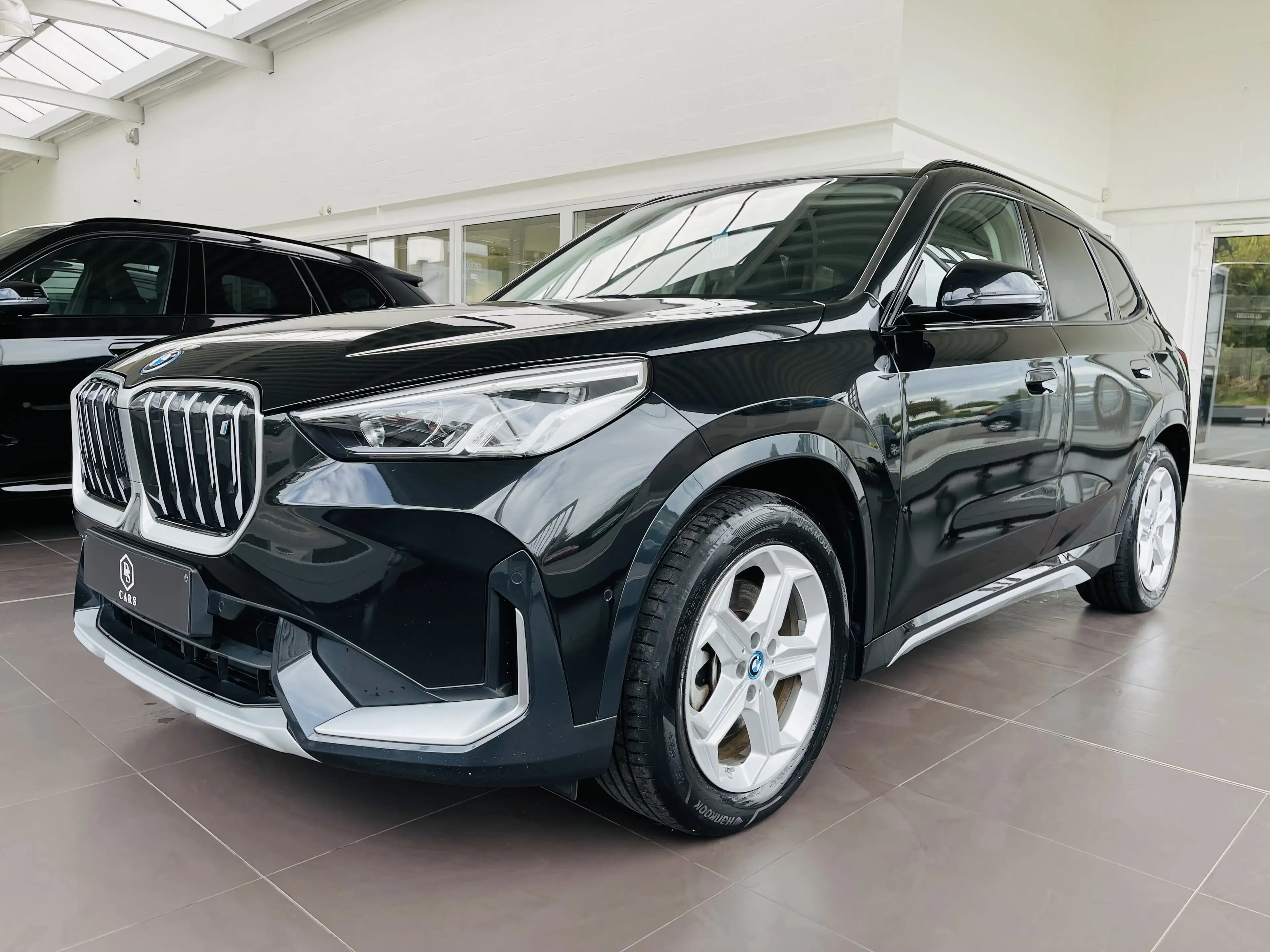 BMW iX1 66.5 kWh xDrive30 *** GARANTIE + X-LINE + LED + GPS + CUIR ***