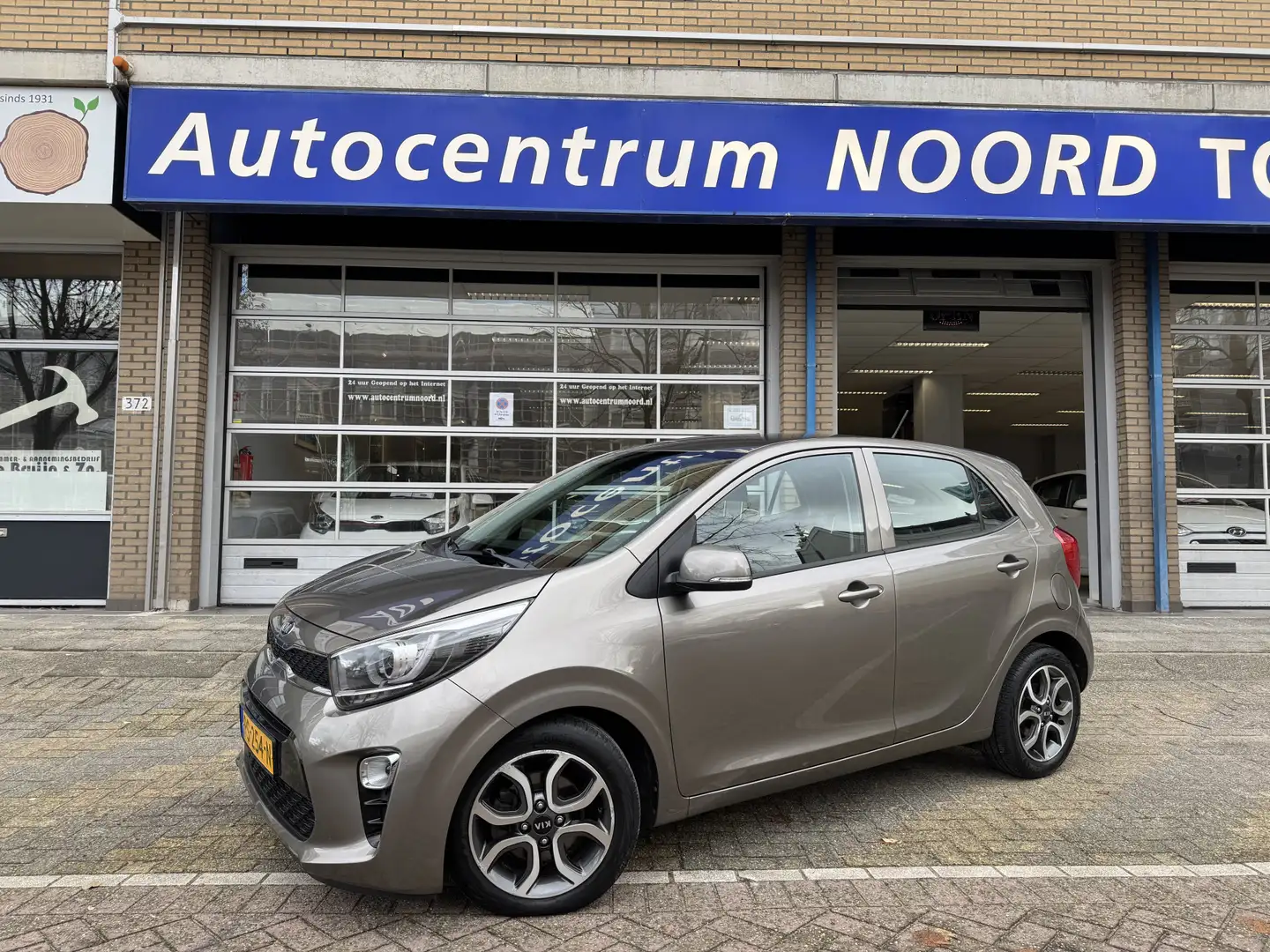 Kia Picanto 1.0 CVVT DynamicPlusLine 68495KM! NAP | Navigatie Gris - 1