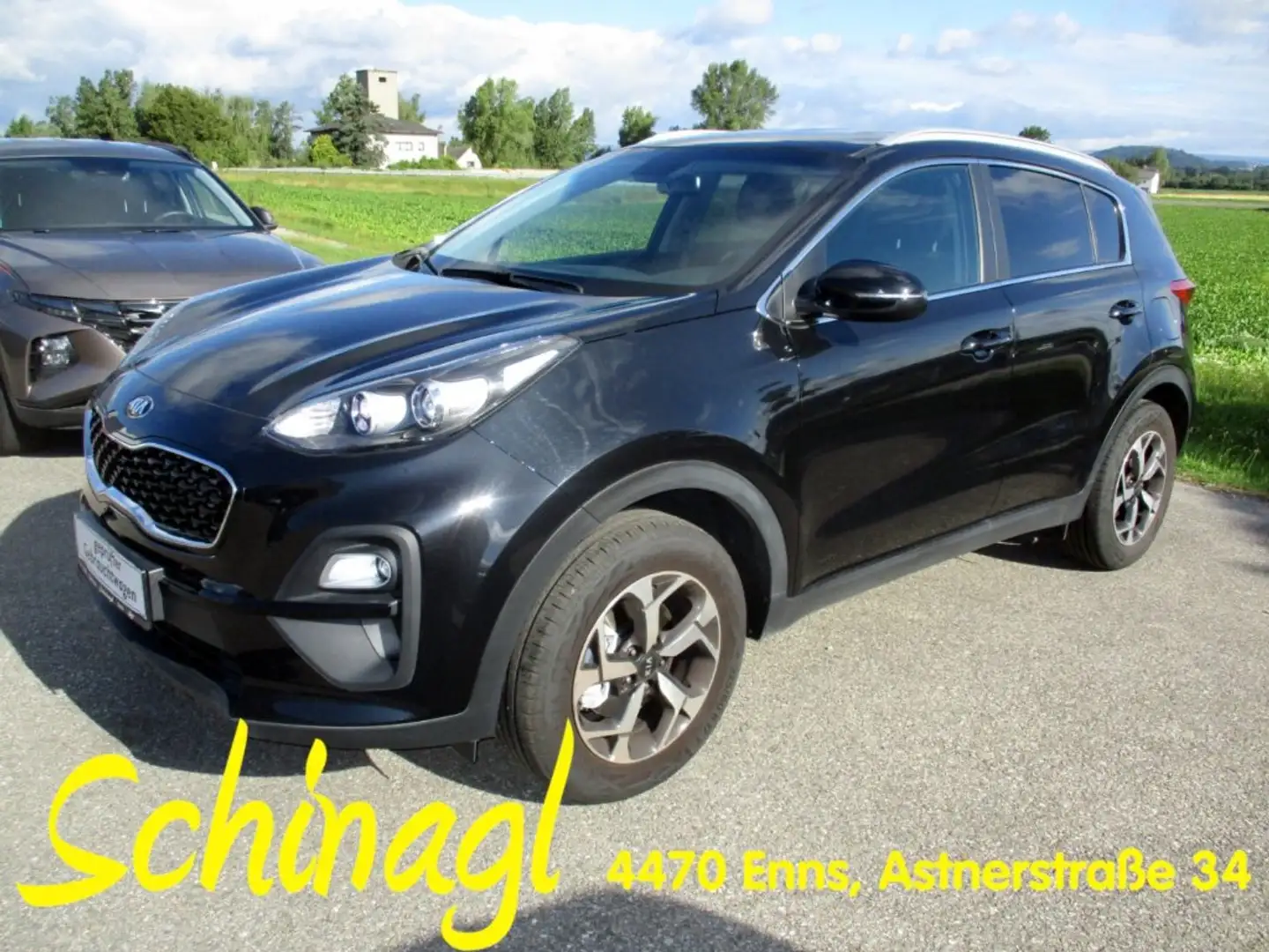 Kia Sportage 1,6 GDi GPF silber Schwarz - 1
