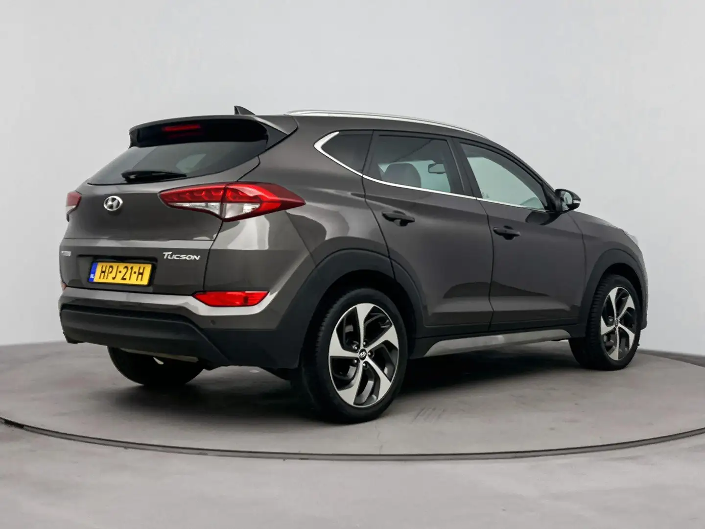 Hyundai TUCSON 1.6 GDi Premium | Navi | leder | Climate control | Bruin - 2