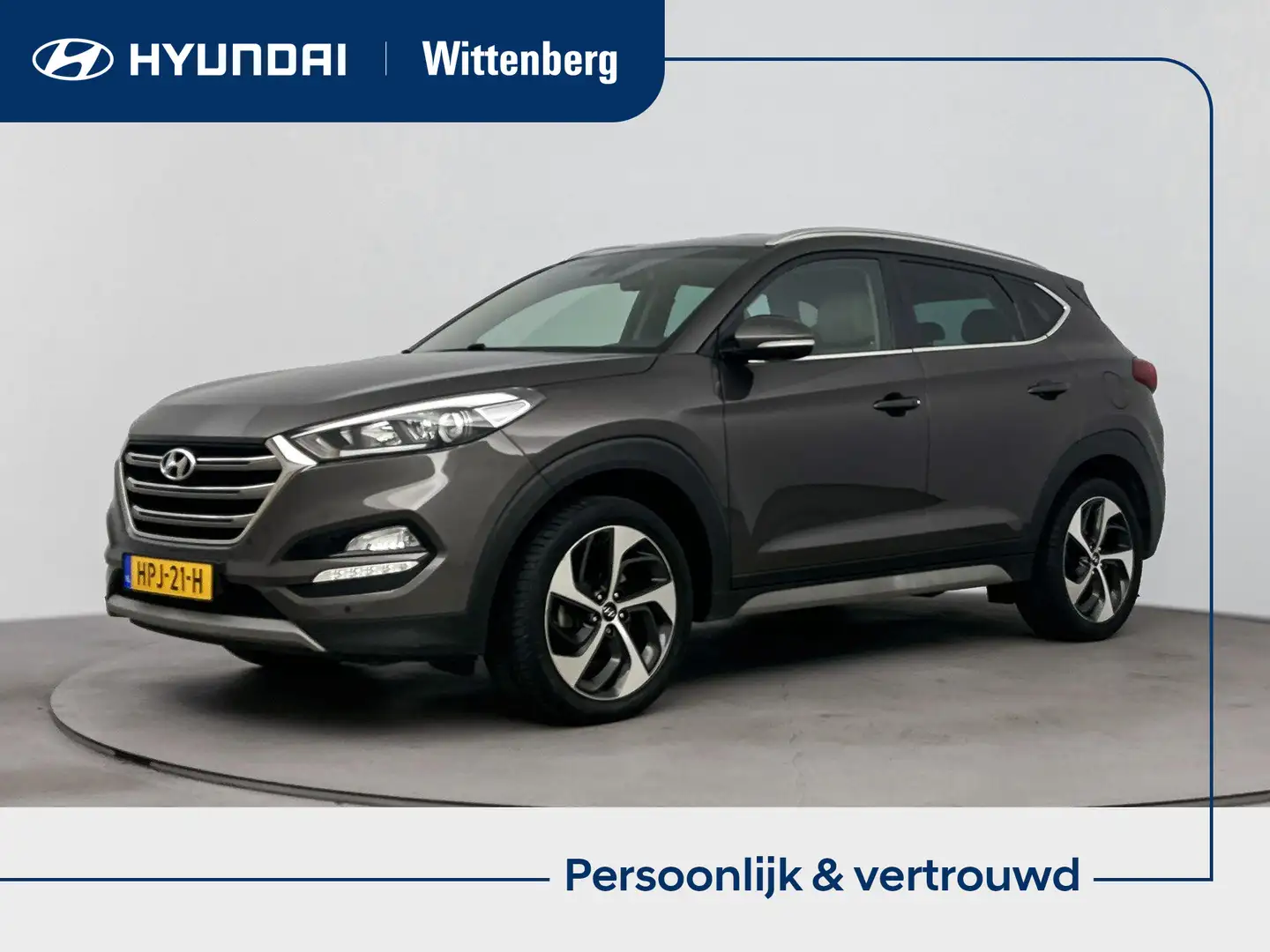 Hyundai TUCSON 1.6 GDi Premium | Navi | leder | Climate control | Bruin - 1