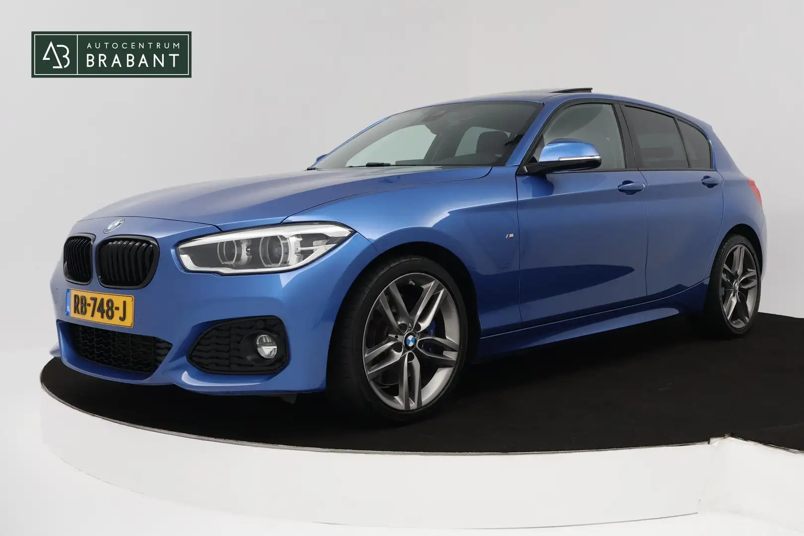 BMW 118 1-serie 118i High Executive M Sport AUTOMAAT (PANO Azul - 1