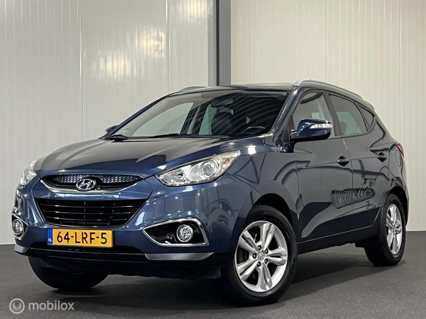 Hyundai iX35 2.0i Business Edition [ NAP trekhaak navi cruise ] Blu/Azzurro - 1