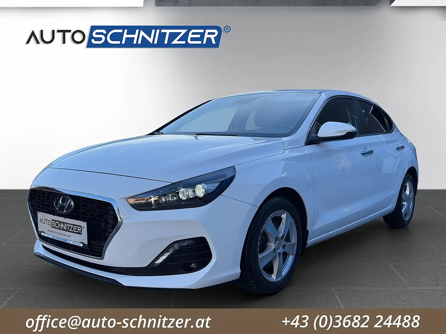 Hyundai i30 Fastback 1,4 T-GDi Premium DCT Aut. Weiß - 1