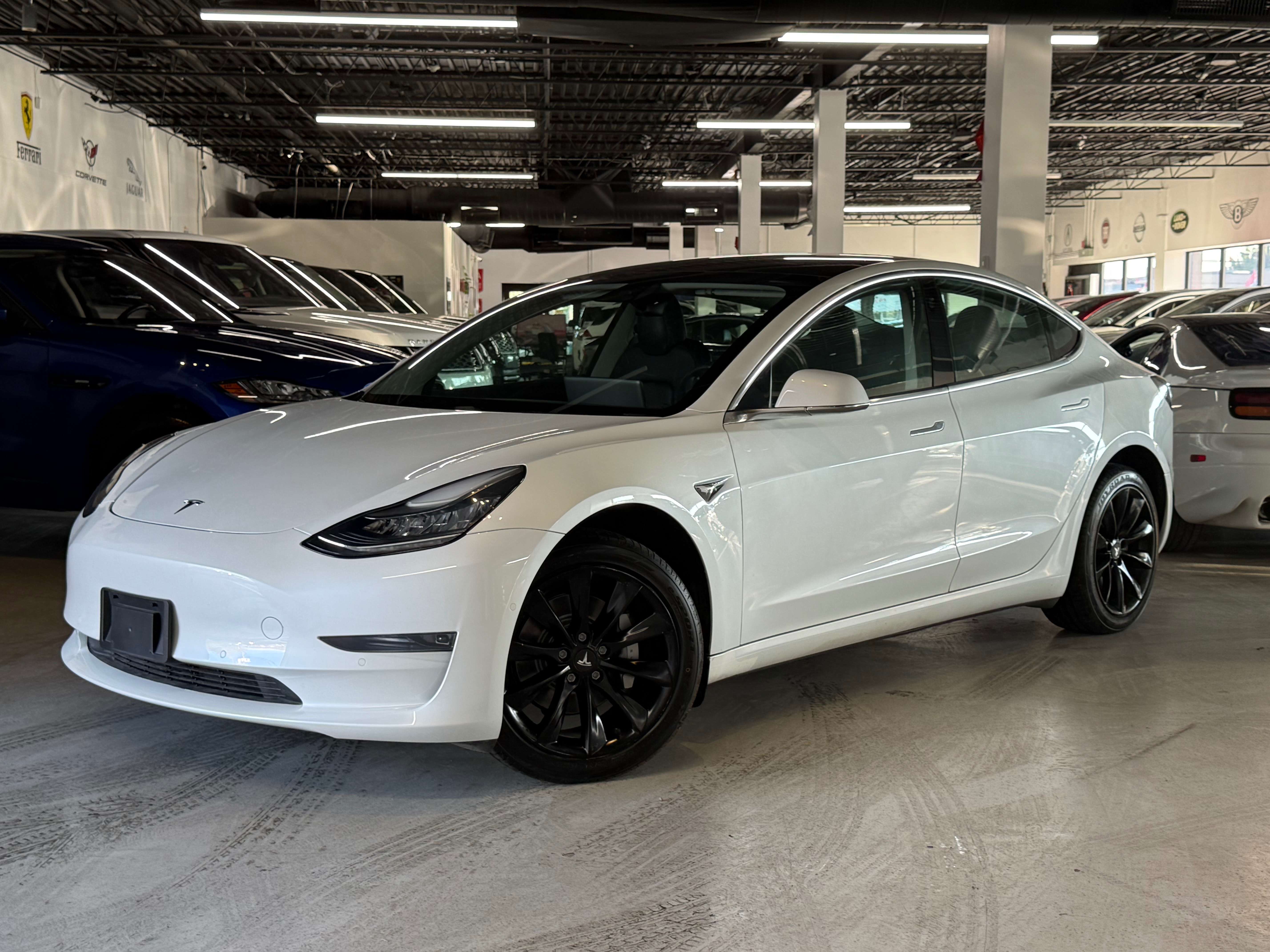 Tesla 2019 Tesla Model 3 Mid Range l RWD