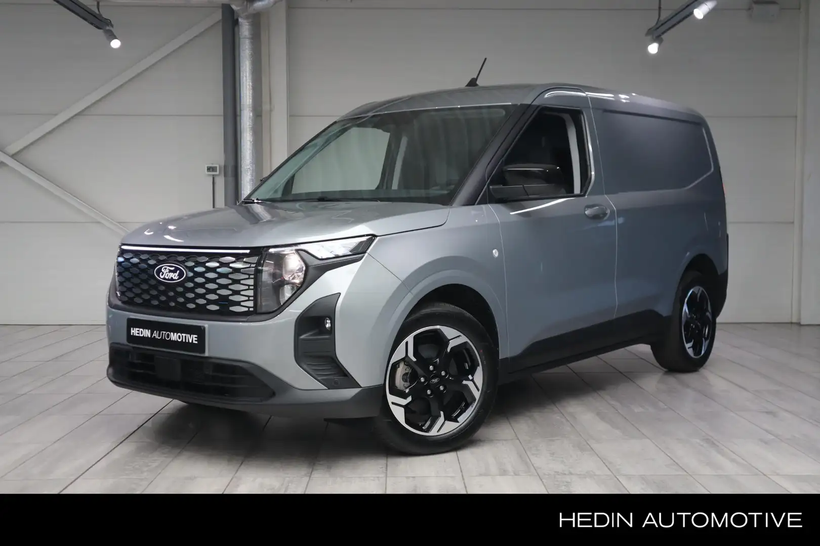 Ford Transit Courier E-Transit Limited 44kwh | UIT VOORRAAD LEVERBAAR! Zilver - 1