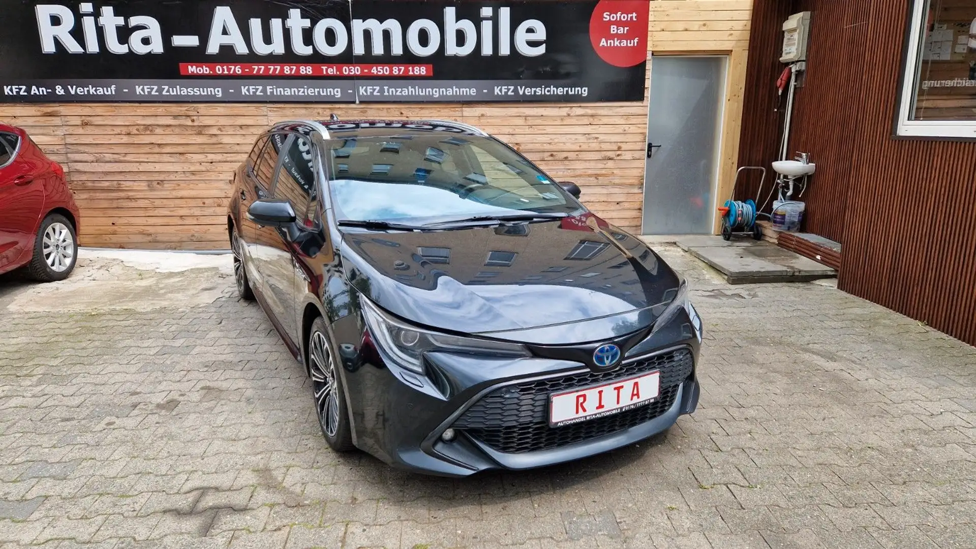 Toyota Corolla 1,8 Hybrid Team Deutschland Touring Schwarz - 1