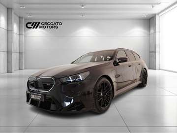 Touring 4.4 727cv auto