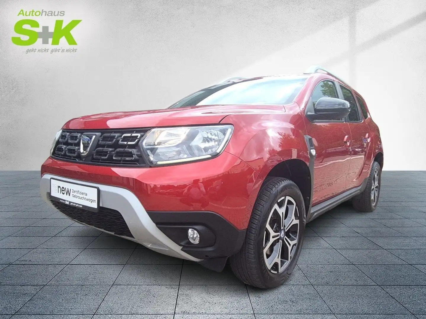 Dacia Duster Celebration TCe 150 2WD GPF *NAVI*CAM*SHZ Rood - 1