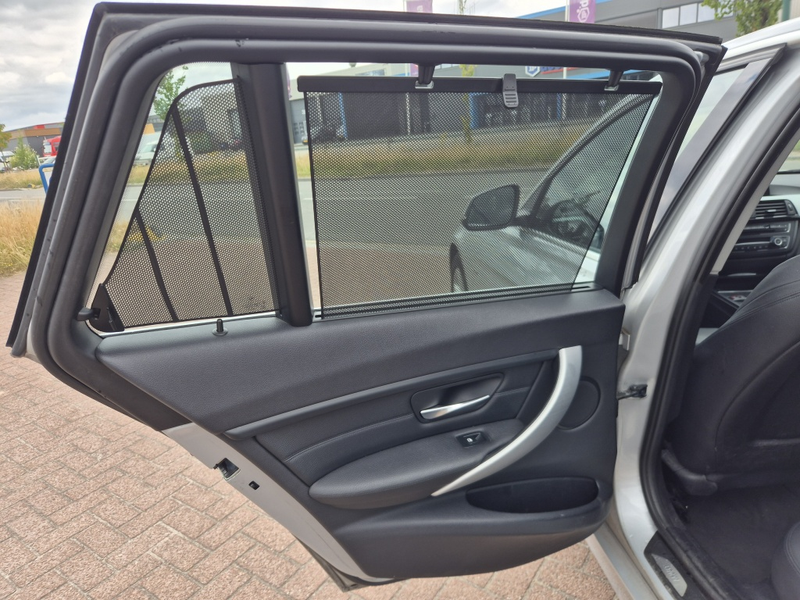 BMW 320 3-serie Touring 320i High Executive — photo 12