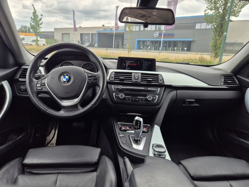 BMW 320 3-serie Touring 320i High Executive — photo 13