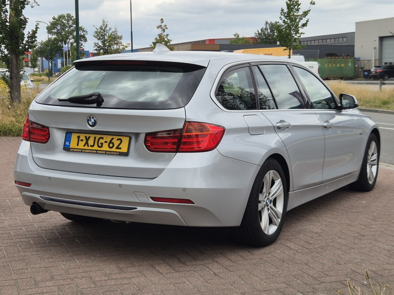 BMW 320 3-serie Touring 320i High Executive — photo 4