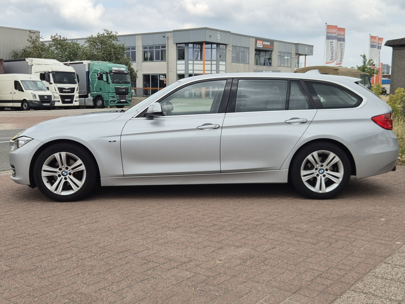 BMW 320 3-serie Touring 320i High Executive — photo 5