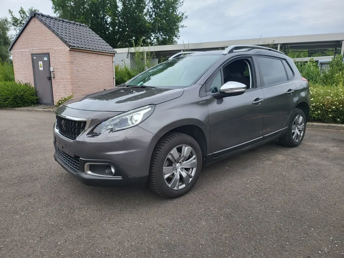 Peugeot 2008 2008 1.2i PureTech Allure ✅AIRCO 🌎GPS Gris - 2
