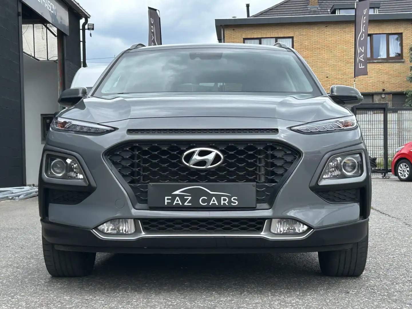Hyundai KONA 1.0 T-GDi * 1ER PROP + CLIM + GPS + CAMERA * Grijs - 2