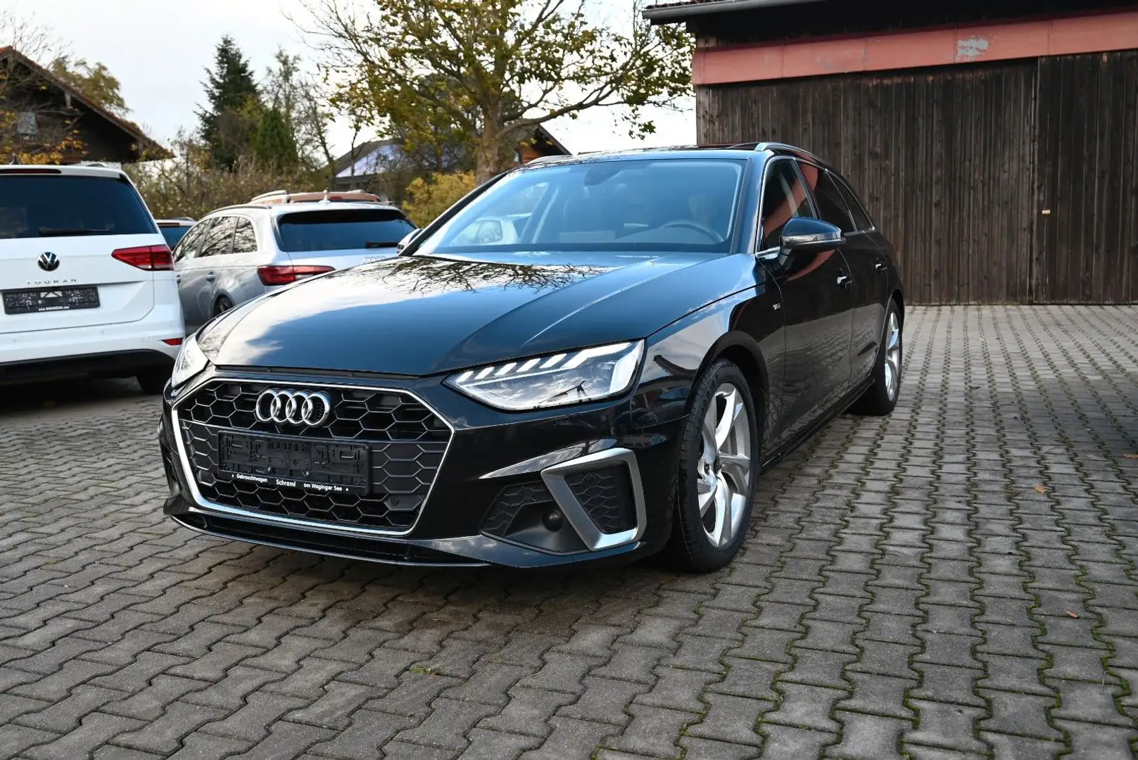Audi A4 Avant 40 TDI S line/Matrix LED/Pano/AHK Zwart - 1
