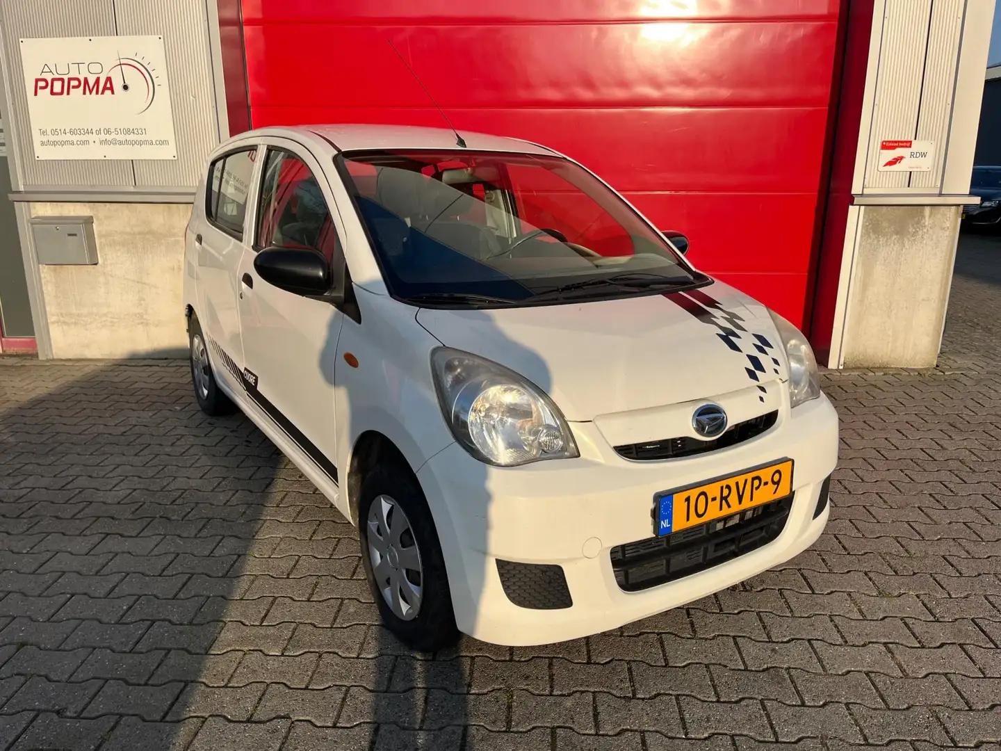 Daihatsu Cuore 1.0 69 pk Comfort / Stuurbekrachtiging / Centrale Weiß - 1