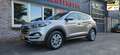 Hyundai TUCSON 1.6 GDi Comfort Trekhaak! Camera! Airco/Clima! Cru Wit - thumbnail 1