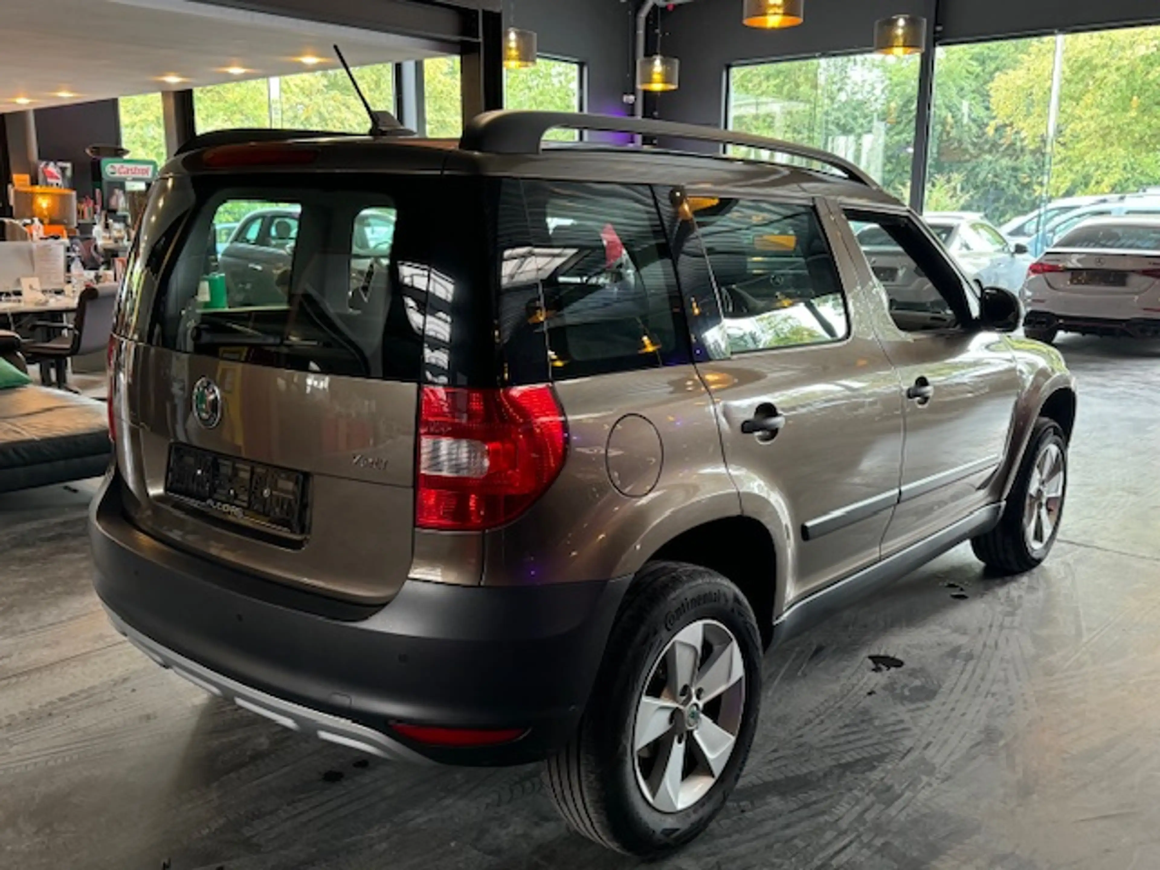 Skoda Yeti 1.2 AUTOMATIQUE DSG - A/C - MEDIA/TEL - GPS - JANTES — photo 9