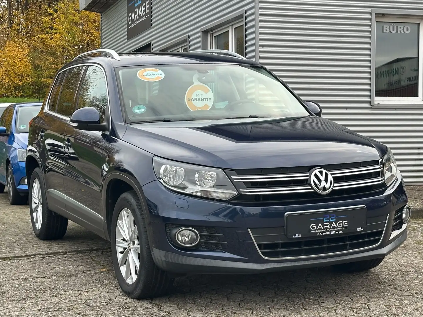 Volkswagen Tiguan Sport & Style 4Motion/Allrad/Pano/AHK Blau - 1