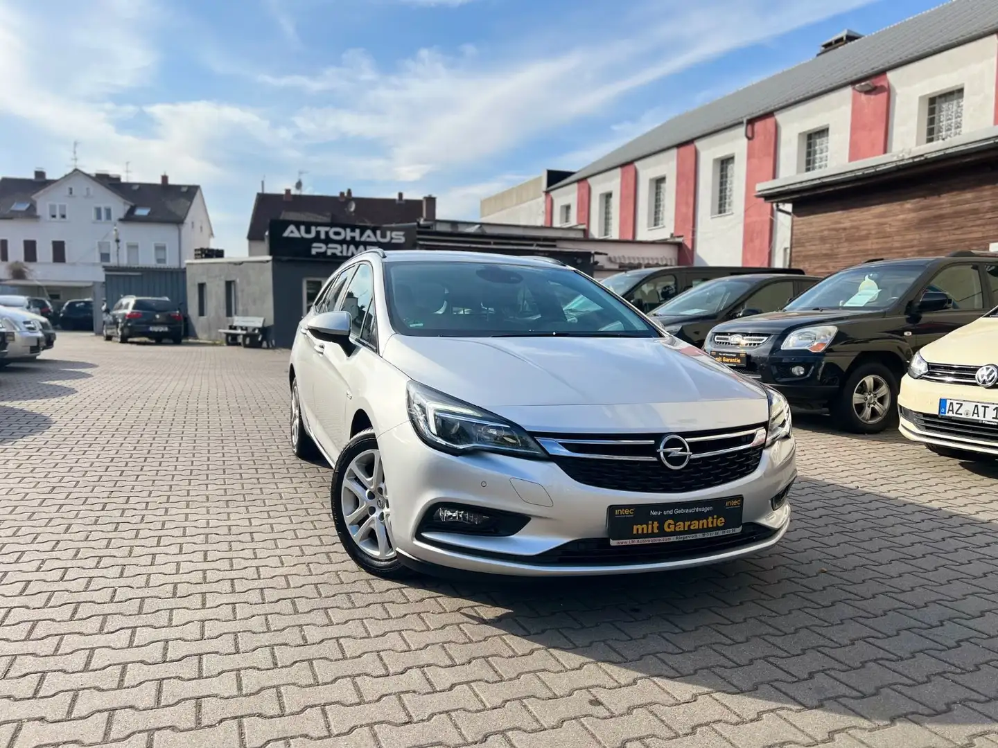 Opel Astra K Sports Tourer Business+NAVI+TEMPO+PDC+SH Zilver - 1