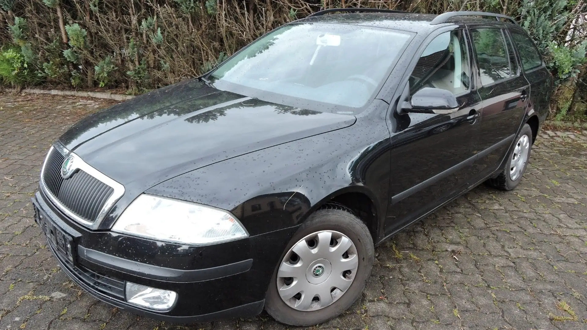 Skoda Octavia Combi 1.6 FSI / Klimaautomatik Schwarz - 1