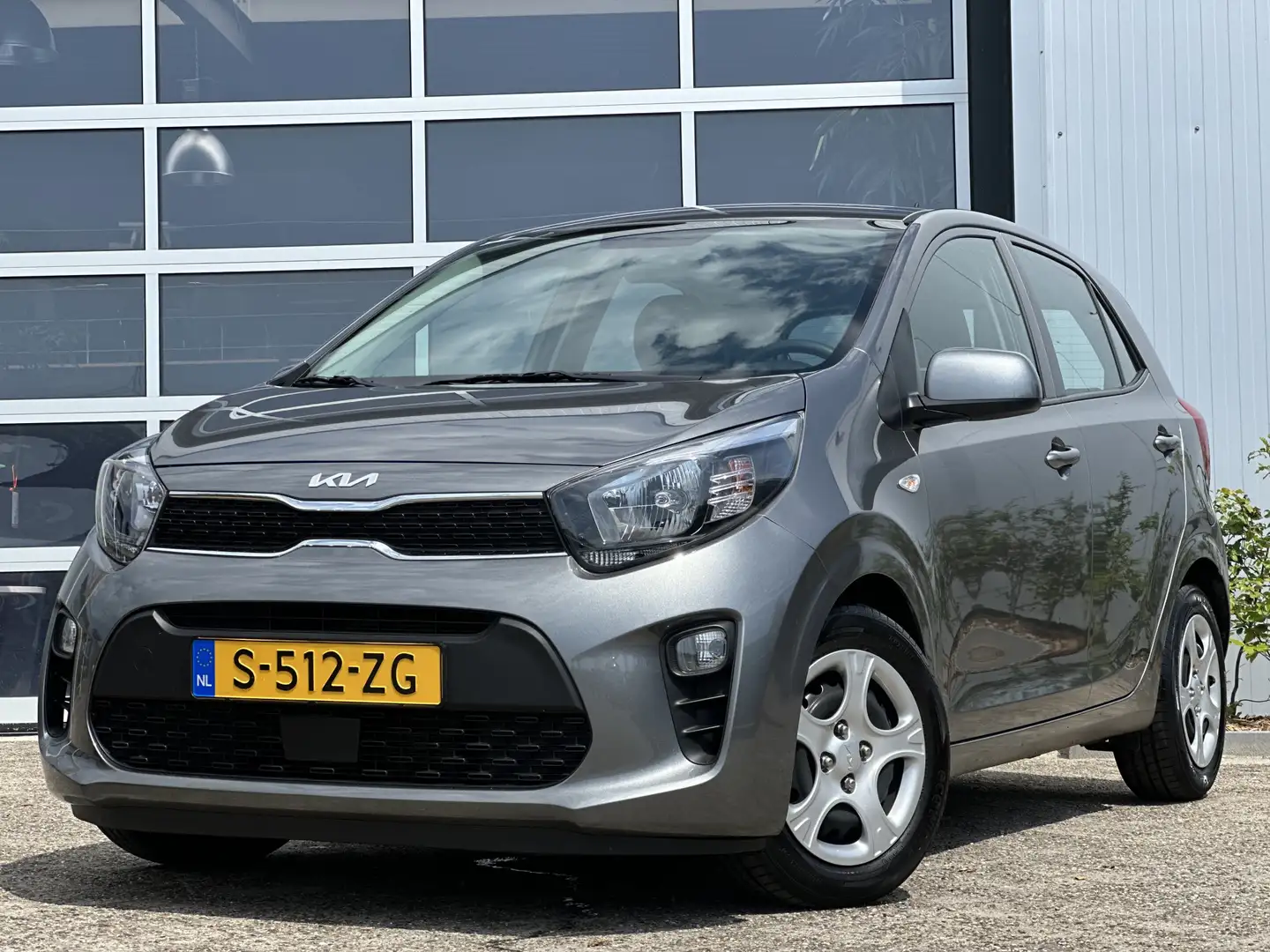 Kia Picanto 1.0 DPi ComfortLine 67pk | Airco | Bluetooth | Cru Grijs - 1